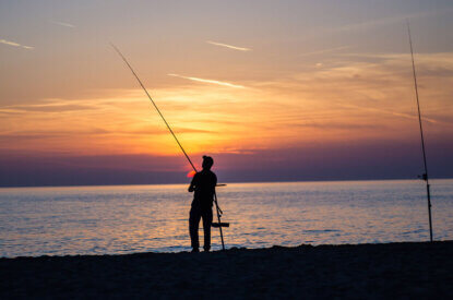 Angler am Meer